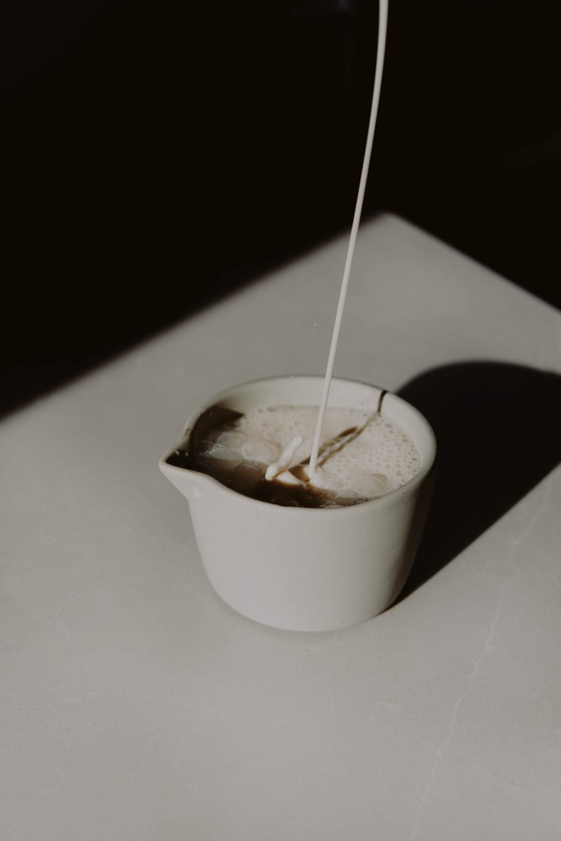 Milk Pour Over A Cup of Drink 